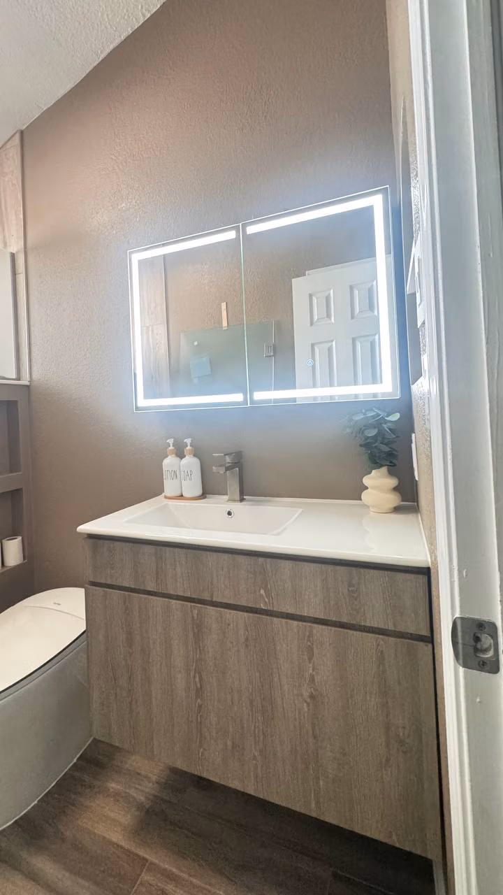 Custom bathroom vanity installation by Forged Builds in El Paso TX